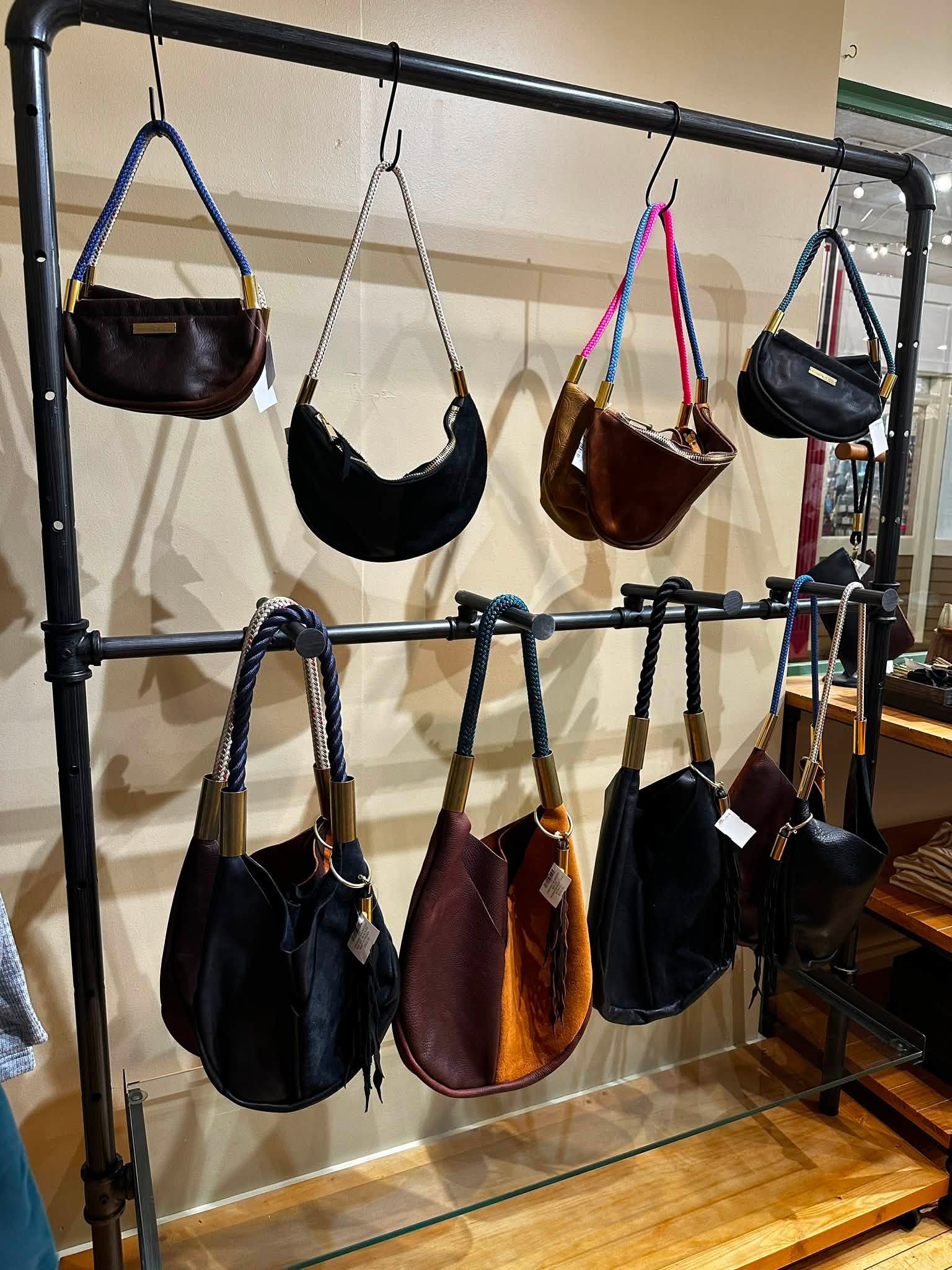 Leather handbags with colorful rope handles